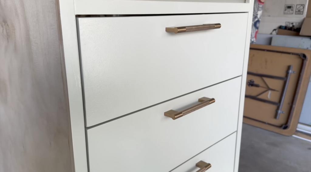 a close up look at the drawers in the custom storage solution build 